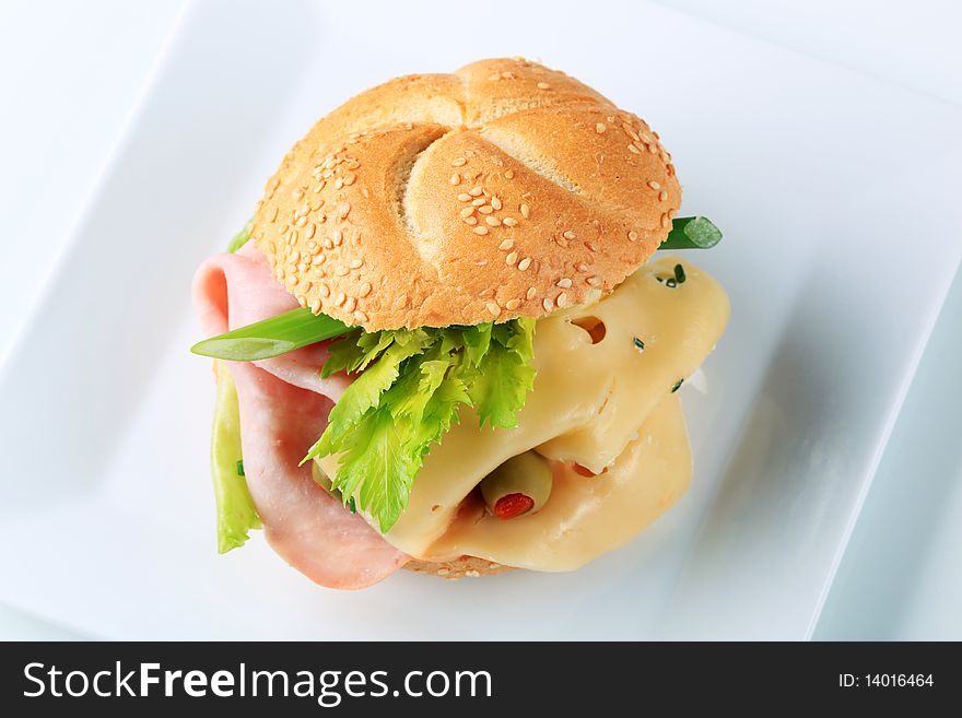Ham and cheese sandwich on a square plate