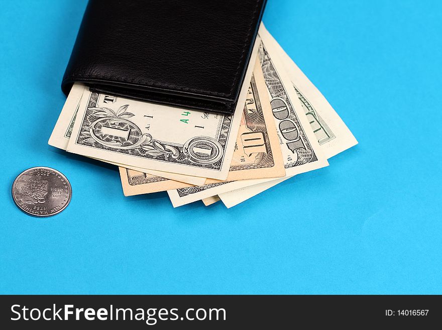 Wallet with dollars. Blue background. Wallet with dollars. Blue background