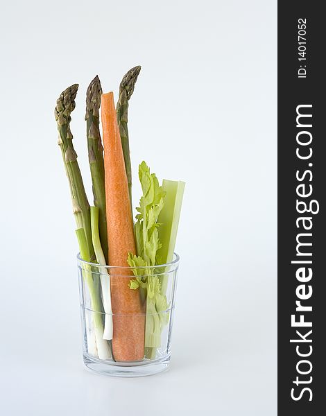 A concept images of fresh vegetables in a glass.