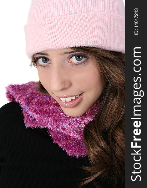 Beautiful teen female wearing a warm pink scarf. Beautiful teen female wearing a warm pink scarf