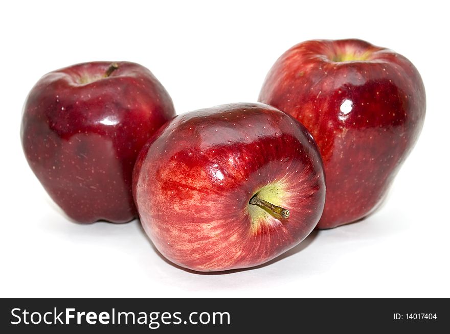 Beautiful red apples isolated on a white background. Beautiful red apples isolated on a white background.