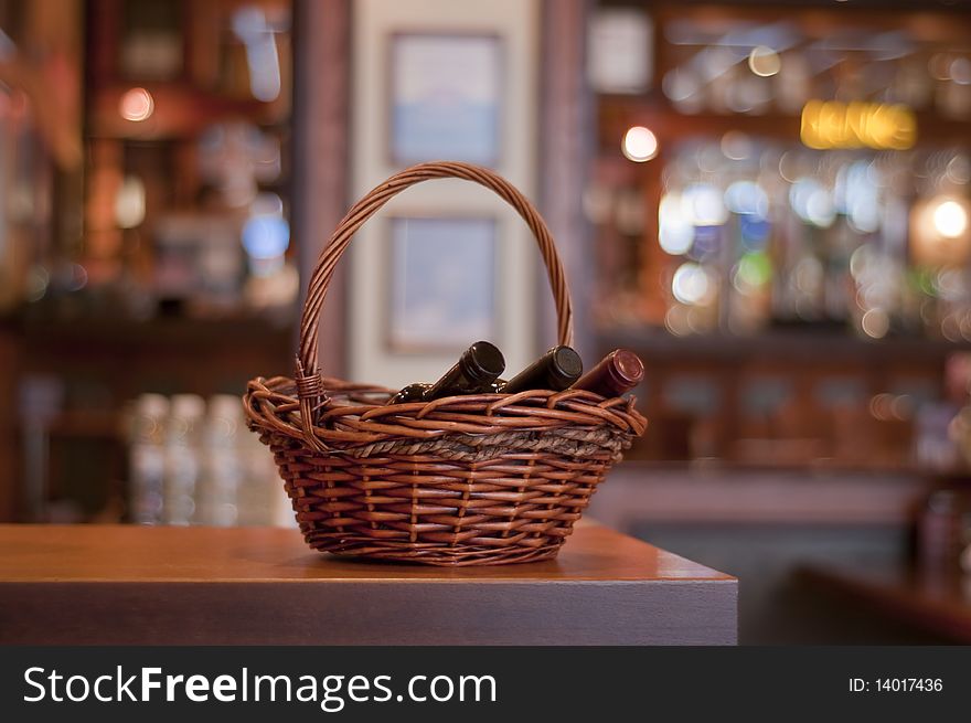 A basket with wine bottles