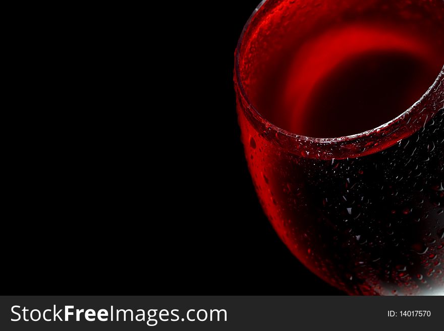 Red wine on black background