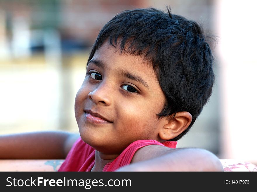 Cute Indian boy looking at the camera