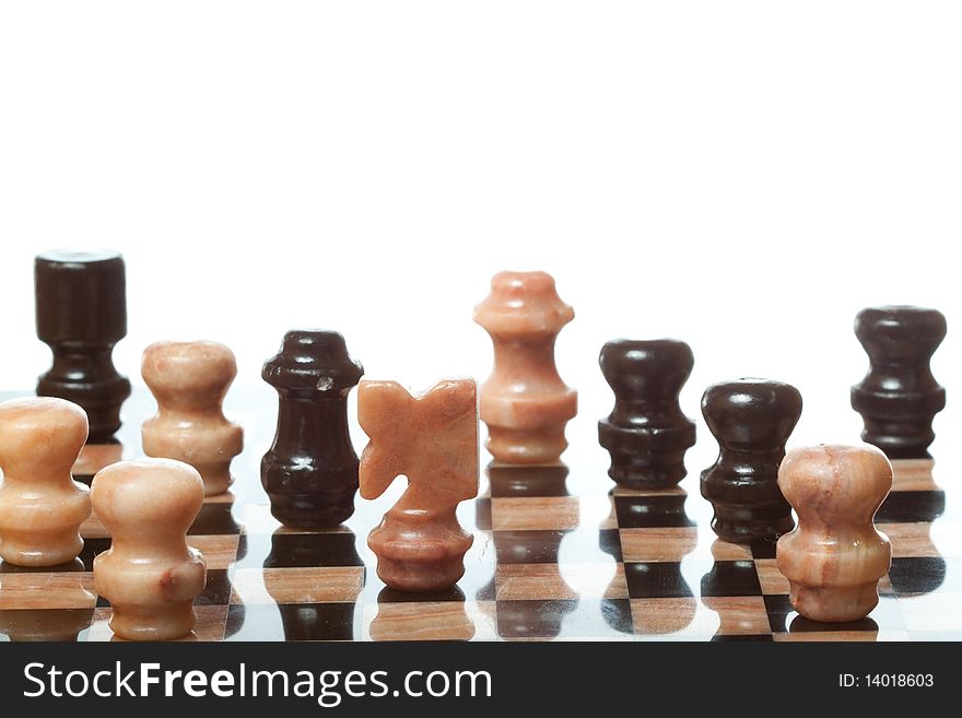 Marble chess on chessboard with isolated background