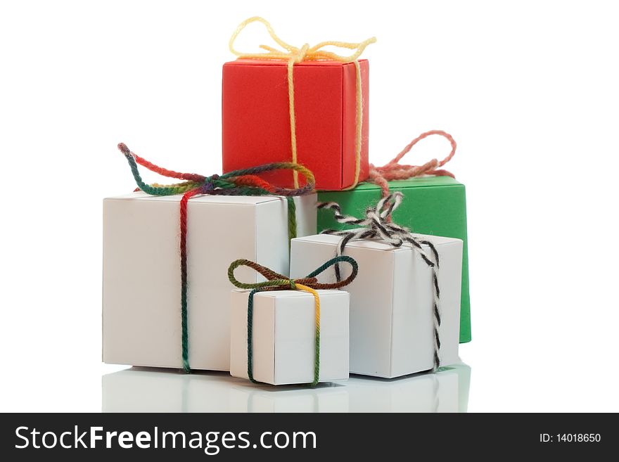 Colorful present boxes on white isolated background. Colorful present boxes on white isolated background