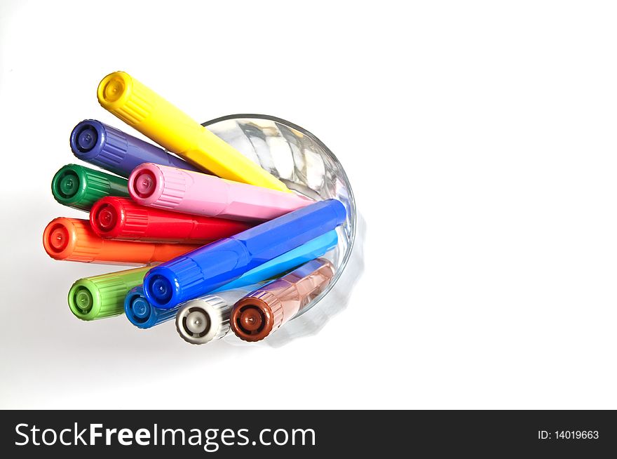 Multicolored markers isolated on a white background