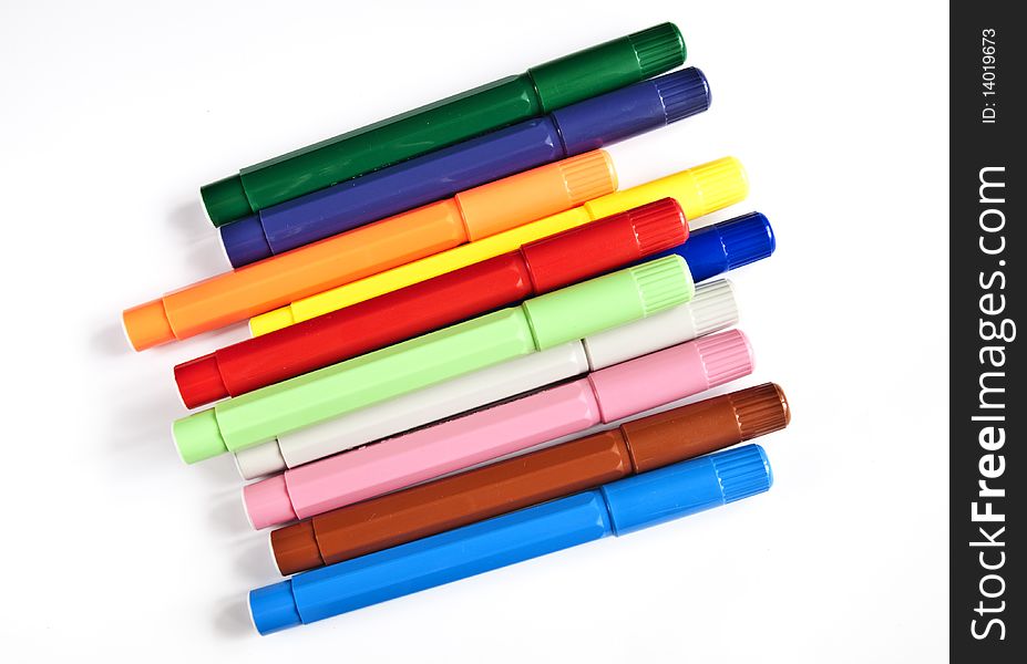 Multicolored markers isolated on a white background