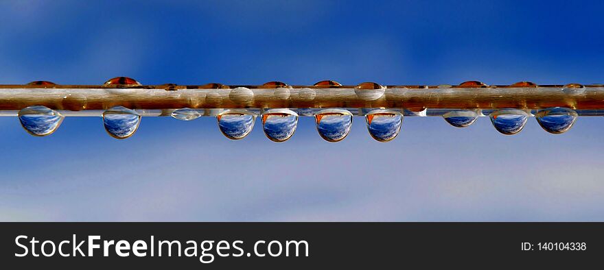 Close up of rain drops on a washing line. Close up of rain drops on a washing line