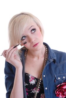 Pretty Blond Girl Putting On Make Up Royalty Free Stock Photo