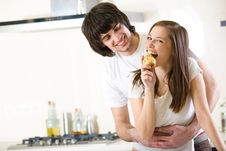 Nice Girl With Pear And With Boy Royalty Free Stock Photography Nice Girl With Pear And With Boy Royalty Free Stock Photography