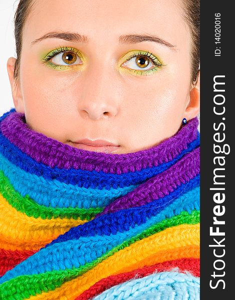 Portrait of a beautiful young girl with colored scarf