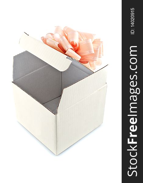 Gift box with rose-colored ribbon