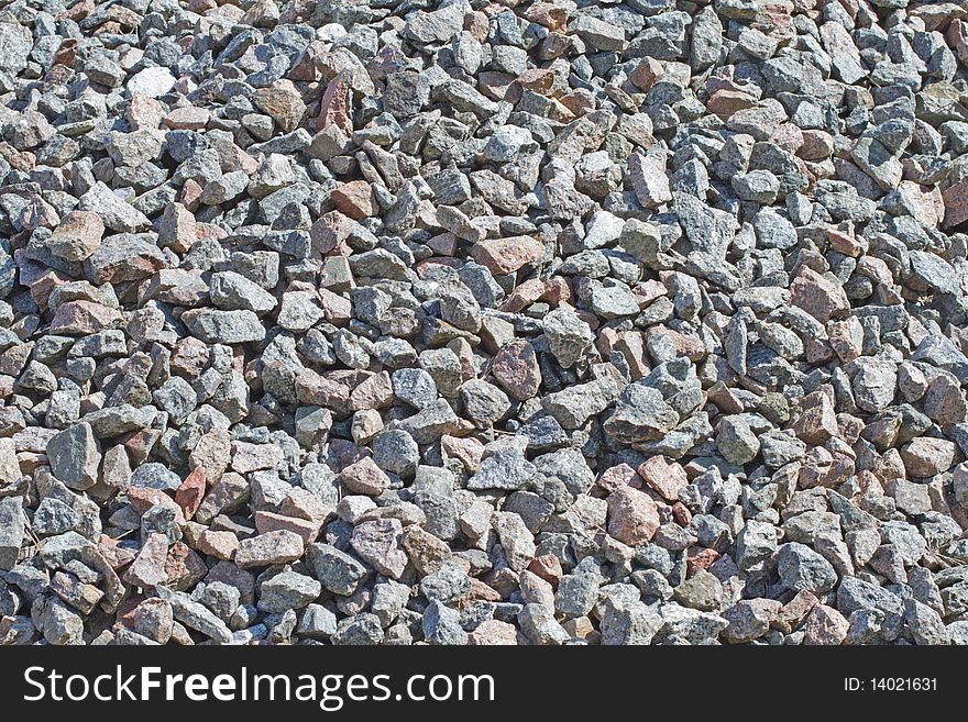 Little gray granite rocks background