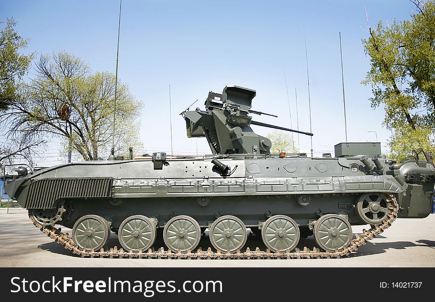 Military armored vehicle at army show with selective focus