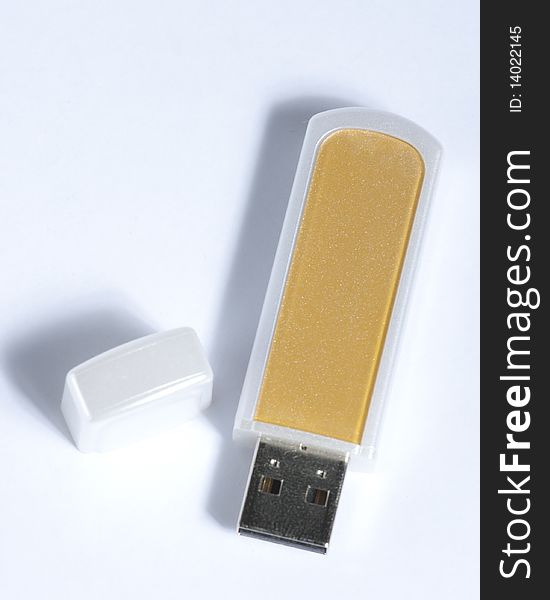 Portable flash usb pen drive memory on white with shadow. Shallow DOF