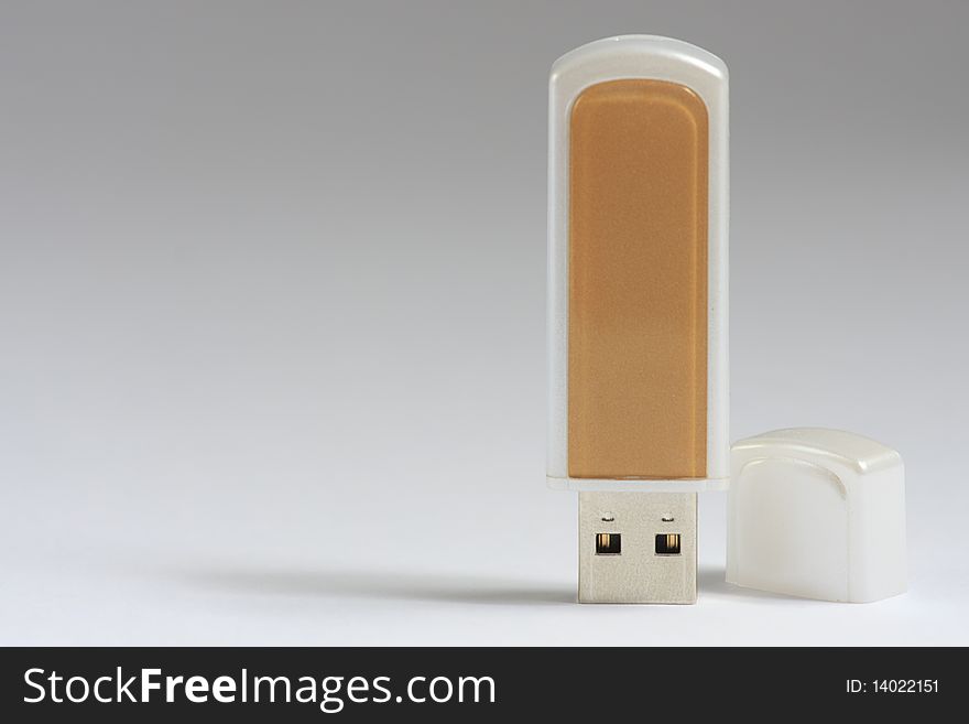 Portable flash usb pen drive memory on white with shadow. Shallow DOF