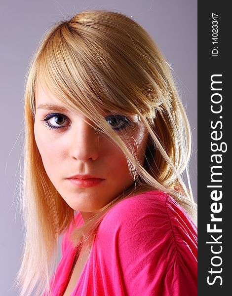 Portrait of beautiful blond woman, studio shot. Portrait of beautiful blond woman, studio shot