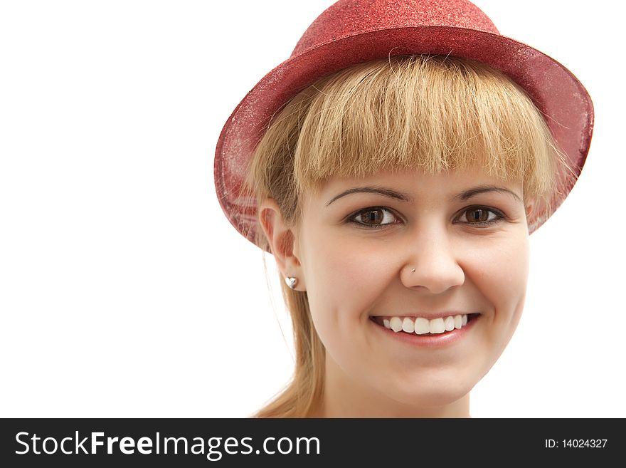 Closeup portrait of a cute young woman wearing a red hat