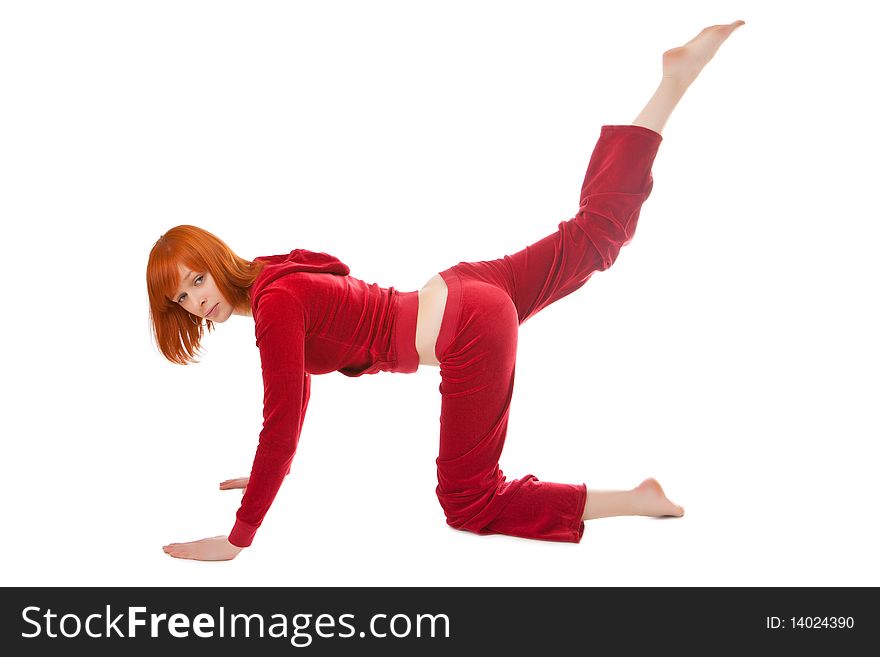 Beautiful girl does exercises on a white background. Beautiful girl does exercises on a white background