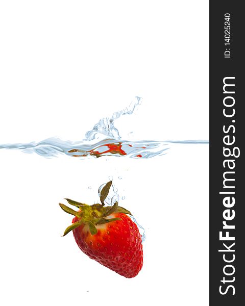 Fresh strawberry splash in water