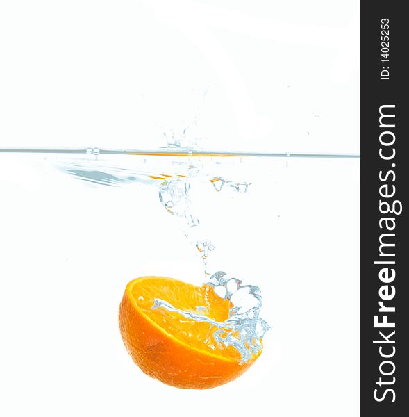 Fresh Orange splash in water