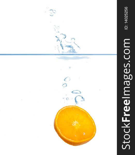 Fresh Orange splash in water