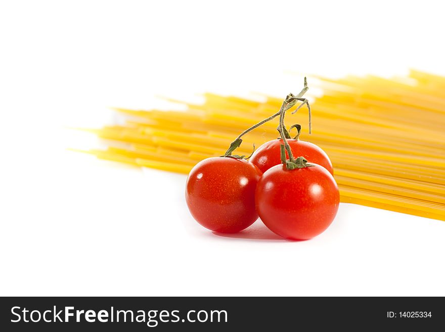 Tomatoes  and pasta isolated on white. Tomatoes  and pasta isolated on white