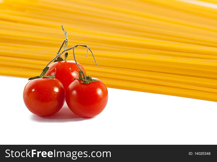Tomatoes  and pasta isolated on white. Tomatoes  and pasta isolated on white