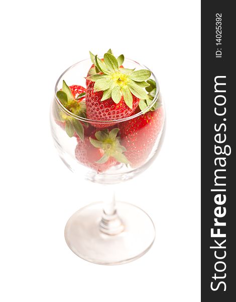 Fresh strawberries in glass on white isolated background. Fresh strawberries in glass on white isolated background
