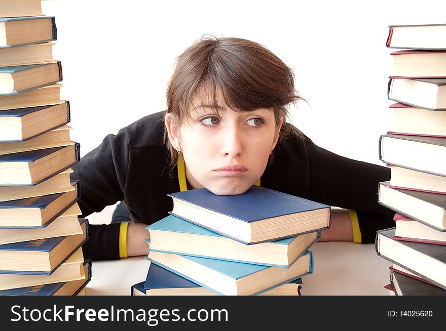 The girl reads books on a white background