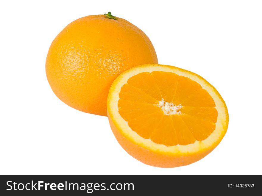 One and half oranges isolated on white