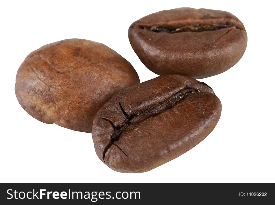 Three grains of coffee it is isolated on a white background