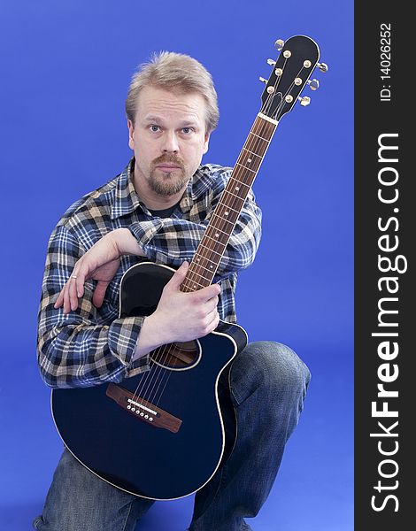 Portrait Of A Man With Guitar