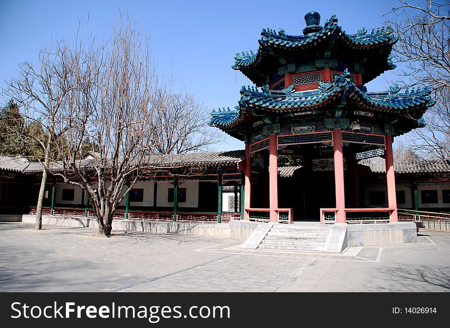 Red chinese pavilion with blue ornate roof