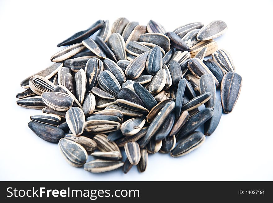 Sunflower seeds isolated on white background. Sunflower seeds isolated on white background