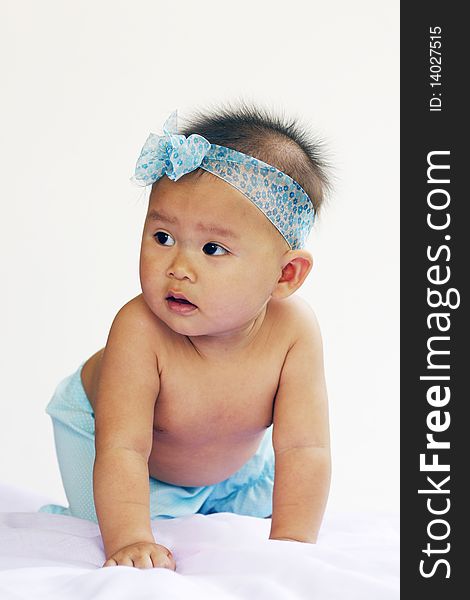 Baby portrait in blue dress