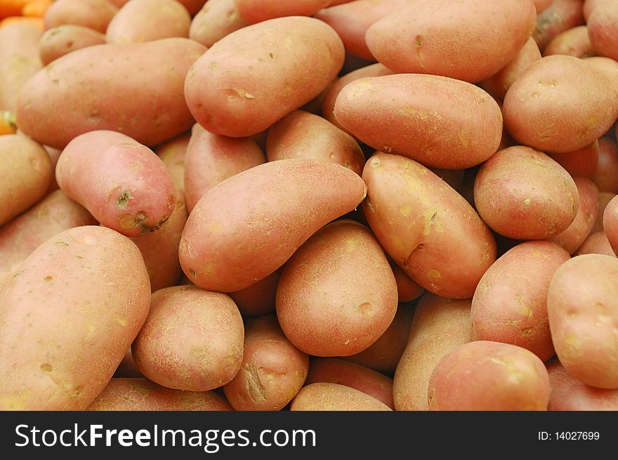 Close Up Of Potatoes On Market Stand