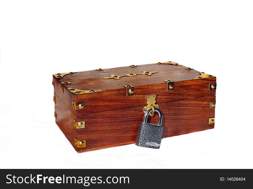 Brown wooden chest (trunk) under lock and key on white. Brown wooden chest (trunk) under lock and key on white