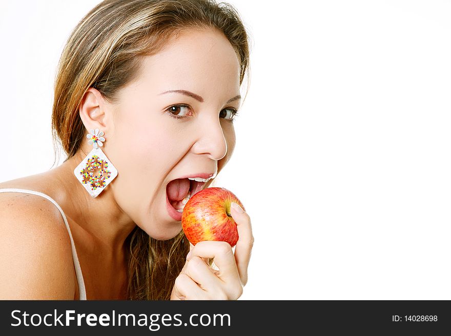 Woman eating apple and looking at the camera, Isolated on white. Woman eating apple and looking at the camera, Isolated on white