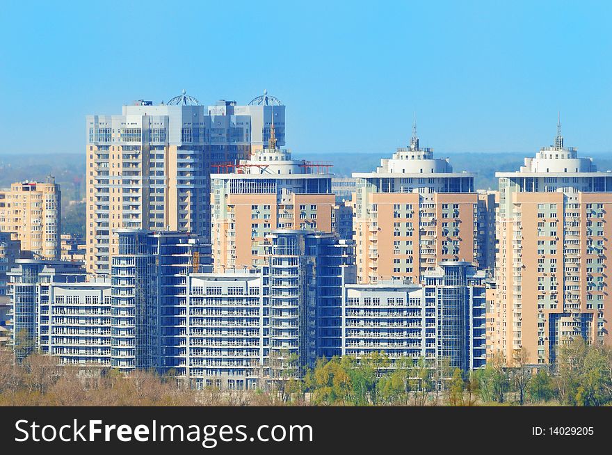 New living high-rises in the city during sunny day. New living high-rises in the city during sunny day