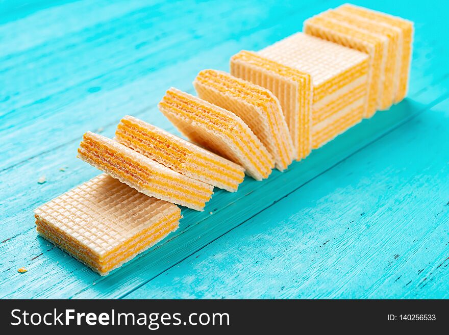 Cheese wafer blocks on blue