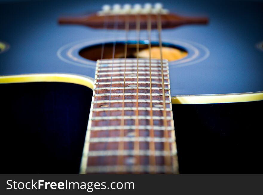 A blue acoustic guitar