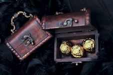 Three Sweets In Small Open Treasure Chest Royalty Free Stock Photos Three Sweets In Small Open Treasure Chest Royalty Free Stock Photos