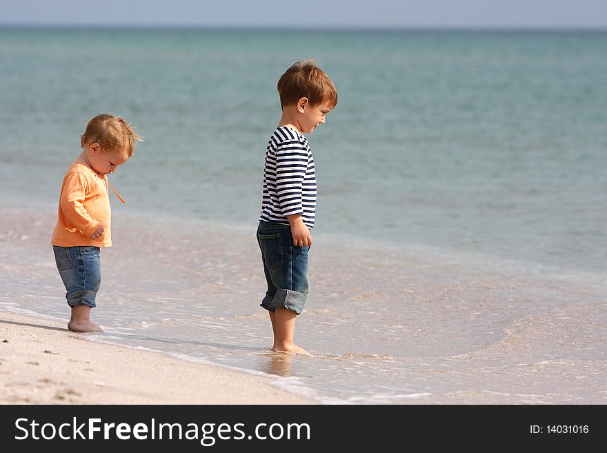 Two kids on sand beach. Two kids on sand beach