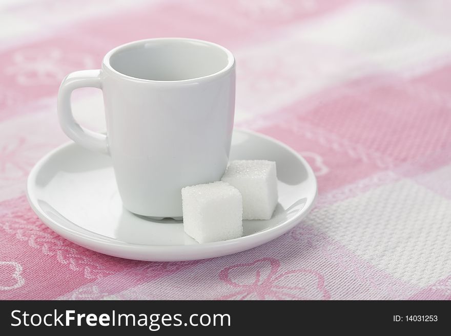 Espresso cup on pink tablecloth. Espresso cup on pink tablecloth