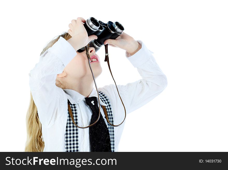 Shot of a girl looking up through a binocular. Isolated over white background. Shot of a girl looking up through a binocular. Isolated over white background.