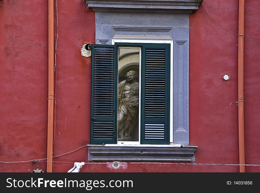 The statue in the window, Naples, Italy