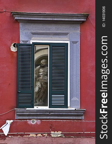 The statue in the window, Naples, Italy