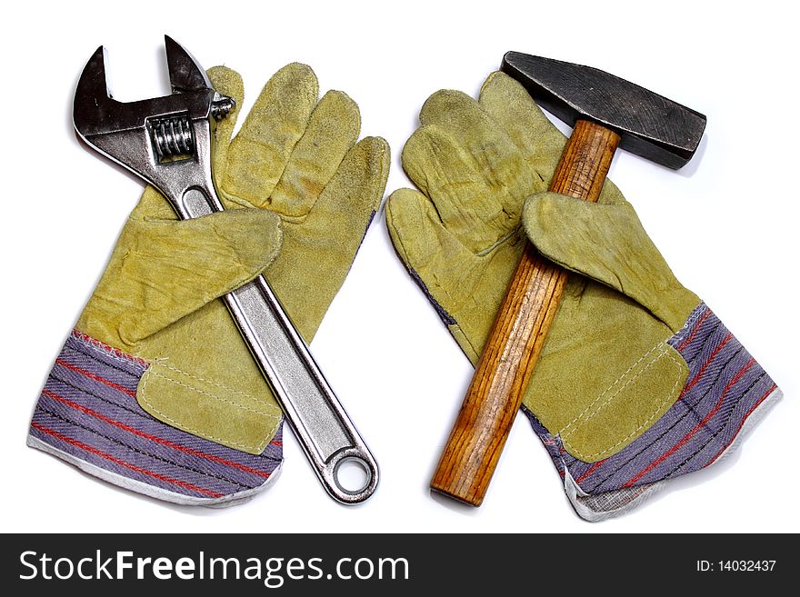 Hammer, crescent wrench and pair of work gloves. Hammer, crescent wrench and pair of work gloves